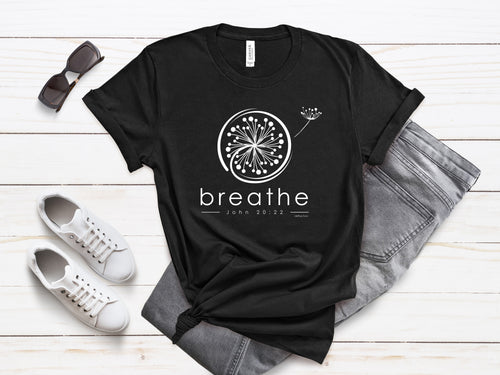 Faith-based Bella+Canvas t-shirt featuring an inspirational I Peter 5:7 design, encouraging you to cast your cares on God and breathe deeply in a chaotic world.